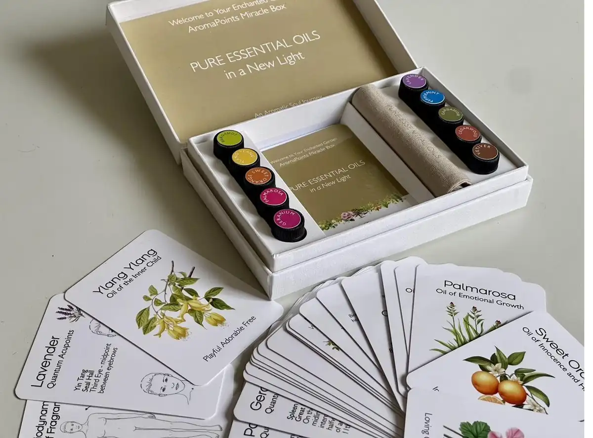 The AromaPoints Miracle Box — ten pure essential oils and illustrated cards